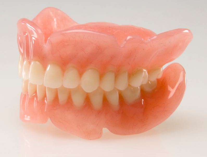 Stock photograph of finished upper and lower full dentures